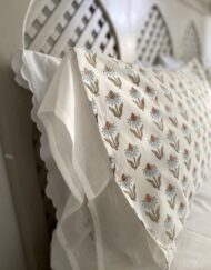 Close-up of blue daisies pillowcases with floral print design